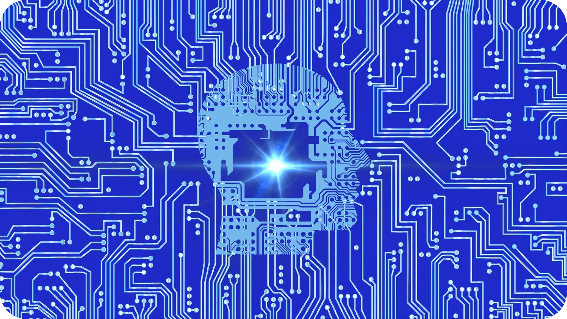 Blue computer chip style illustration, with a profile of a man's head in the centre to represent AI.